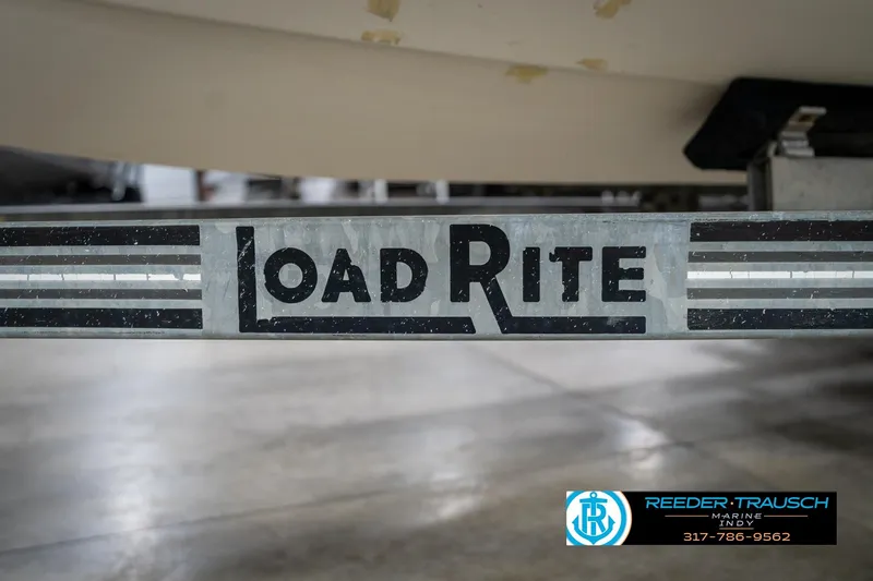 Slide: The Image of Load Rite trailer for 2000 Bryant 196 Limited boat at Reeder Trausch Marine. - 48