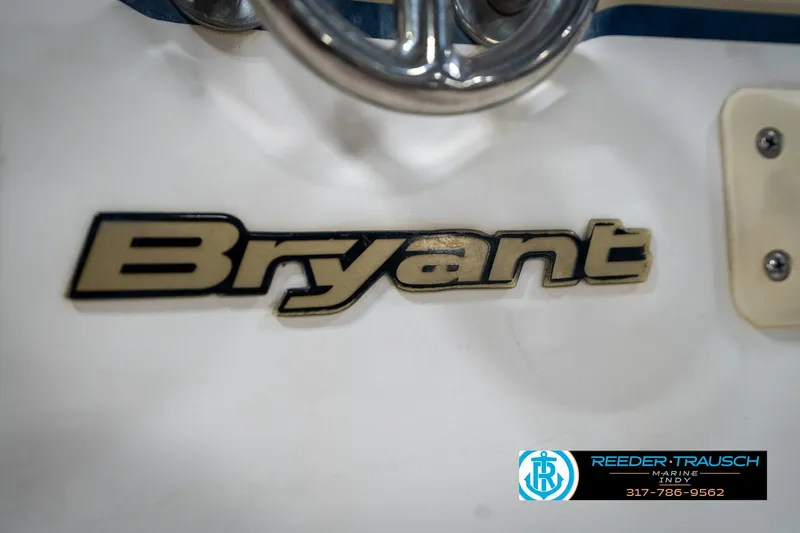 Slide: The Image of Bryant 196 Limited 2000 boat logo with Reeder Trausch Marine contact details. - 52