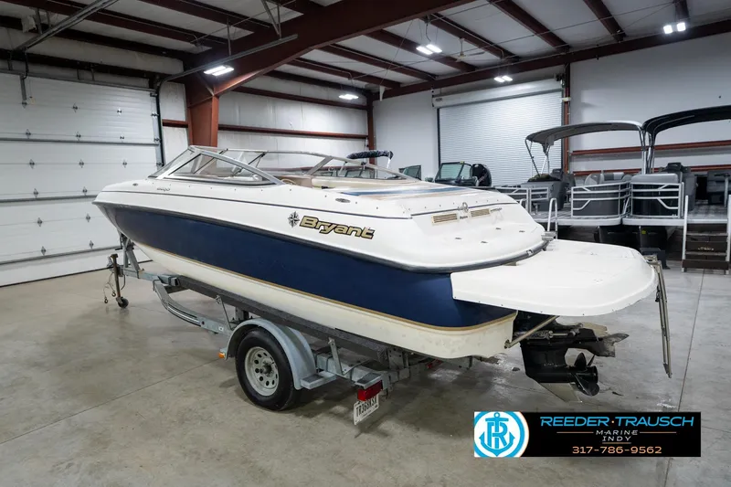 Slide: The Image of 2000 Bryant 196 Limited boat on trailer in indoor storage facility. - 8