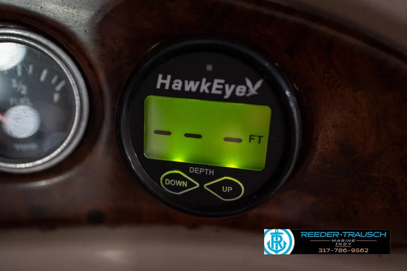 Slide: The Image of Depth gauge on 2000 Bryant 196 Limited boat dashboard, featuring HawkEye display. - 30