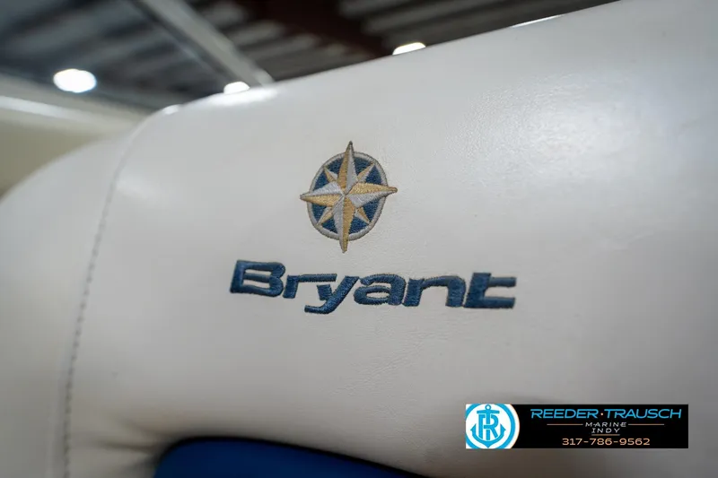 Slide: The Image of Bryant 196 Limited 2000 boat seat with logo and compass emblem. - 38