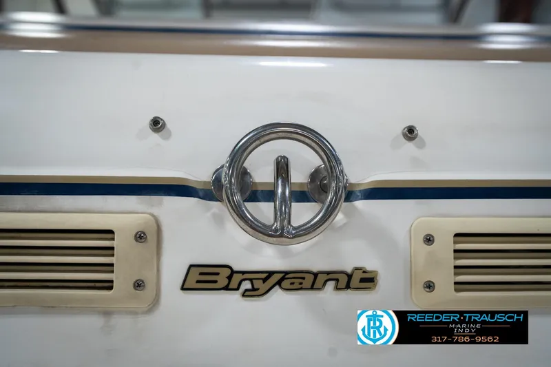 Slide: The Image of Rear view of a 2000 Bryant 196 Limited boat with logo and vents. - 50