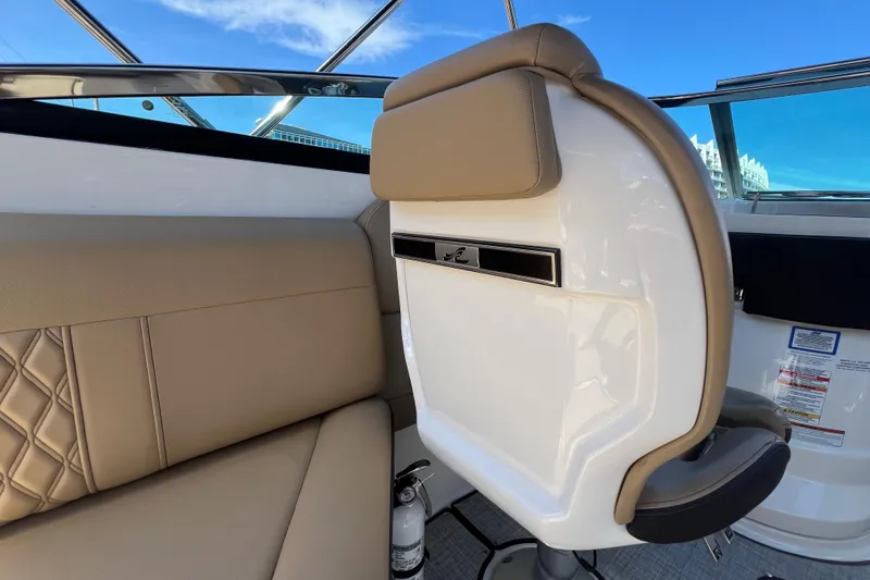 Slide: The Image of Interior of 2020 Sea Ray 280 SLX boat with beige seating and modern design. - 27