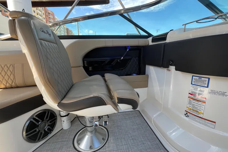 Slide: The Image of Interior of 2020 Sea Ray 280 SLX boat with beige seating and modern design. - 28