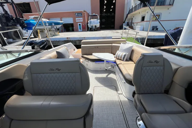 Slide: The Image of Interior of a 2020 Sea Ray 280 SLX boat with luxurious seating and modern design. - 38