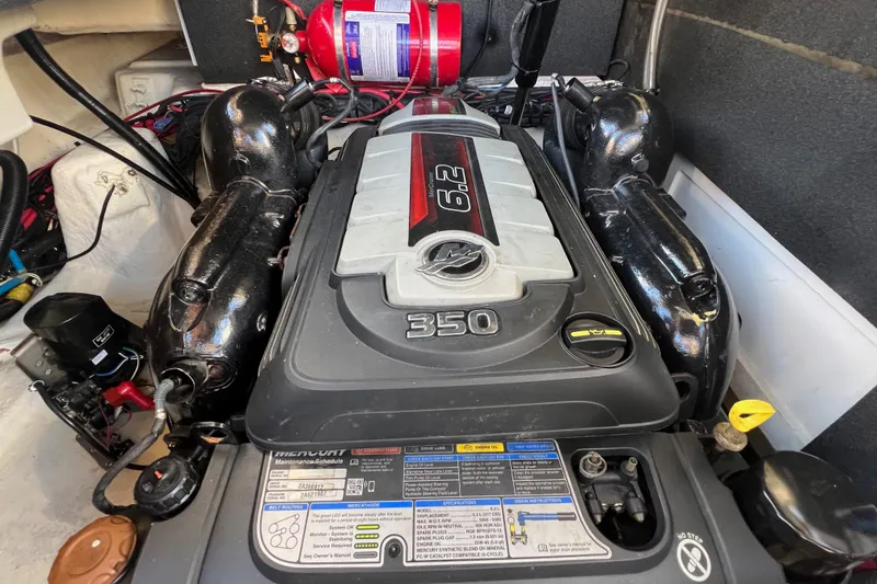 Slide: The Image of Engine compartment of a 2020 Sea Ray 280 SLX boat, featuring a Mercury 6.2L engine. - 40