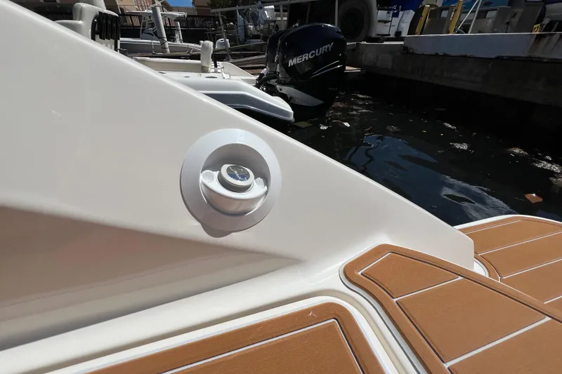 Slide: The Image of 2020 Sea Ray 280 SLX boat with Mercury engine, docked at marina. - 49