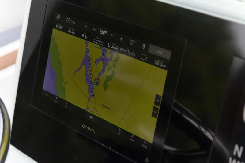 Slide: The Image of Garmin navigation display on 2022 Crevalle 26 HBW boat, showing detailed map. - 17