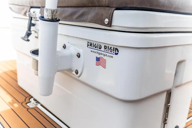 Slide: The Image of 2022 Crevalle 26 HBW boat with Frigid Rigid cooler and American flag decal. - 31