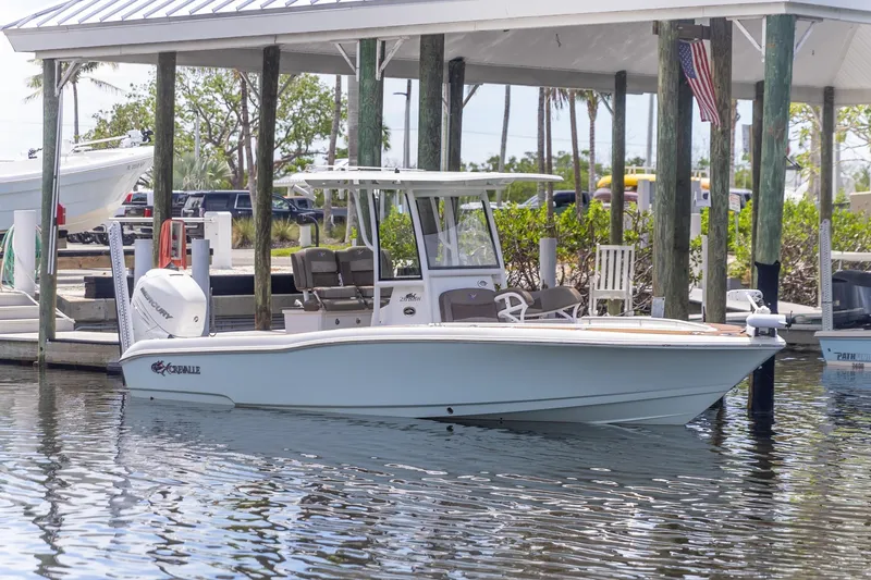 Slide: The Image of 2022 Crevalle 26 HBW boat docked at marina, featuring sleek design and modern amenities. - 32