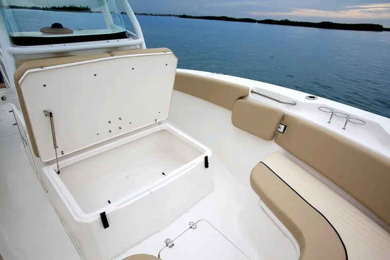 Slide: The Image of Manufacturer Provided Image: 2018 Sea Fox 266 Commander boat interior with open storage compartment and seating. - 10