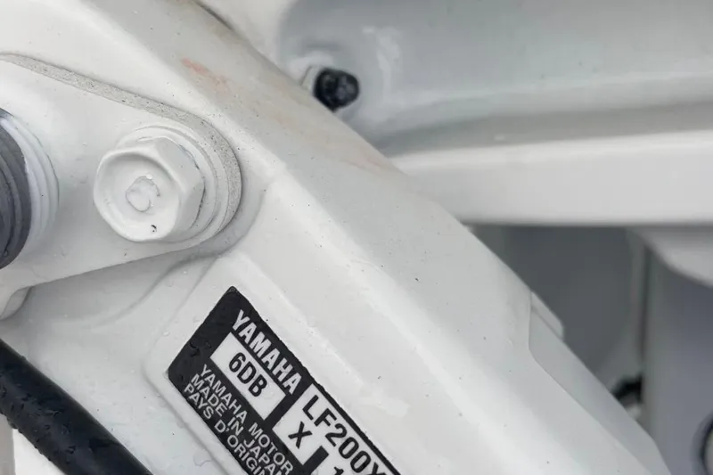 Slide: The Image of Close-up of a Yamaha motor part on a 2018 Sea Fox 266 Commander boat. - 17