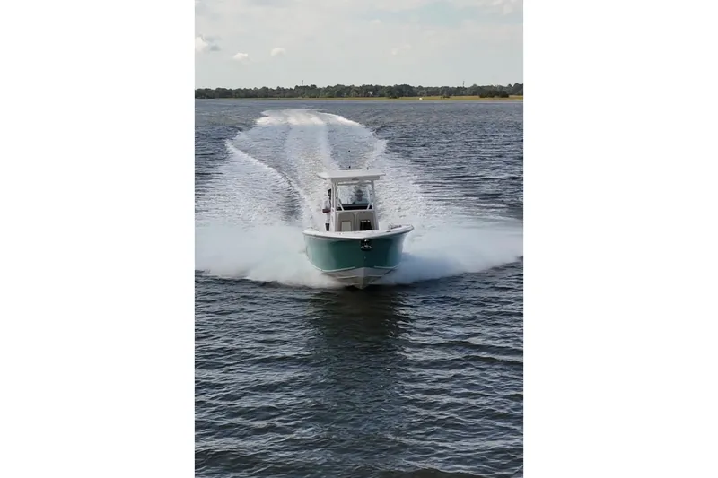 Slide: The Image of 2018 Sea Fox 266 Commander boat cruising on open water. - 20