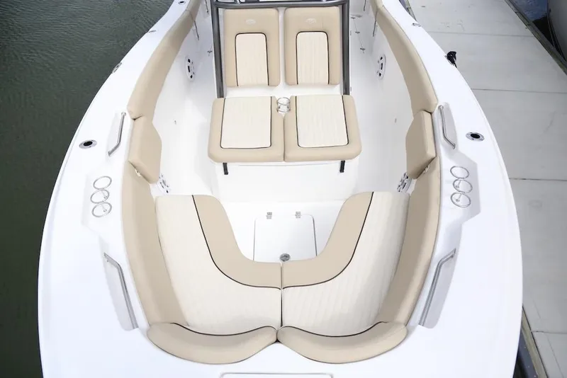 Slide: The Image of Manufacturer Provided Image: 2018 Sea Fox 266 Commander boat with beige seating and cup holders. - 7