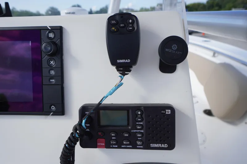 Slide: The Image of 2019 Tidewater 220 LXF boat console with Simrad electronics and WizGear mount. - 23