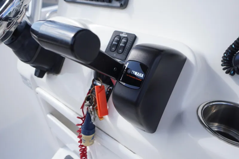 Slide: The Image of Close-up of Yamaha remote control on 2019 Tidewater 220 LXF boat console. - 24