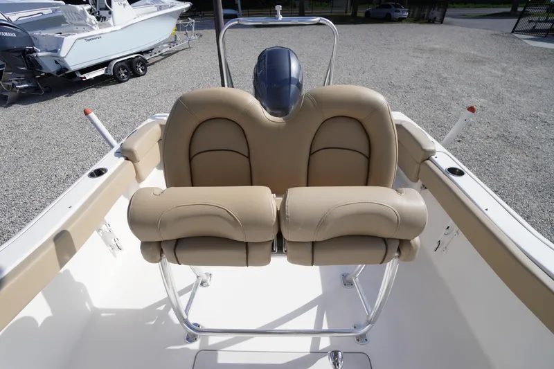Slide: The Image of 2019 Tidewater 220 LXF boat with beige seating and stainless steel frame. - 37