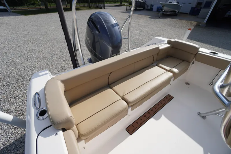 Slide: The Image of 2019 Tidewater 220 LXF boat with beige seating and Yamaha outboard motor. - 40