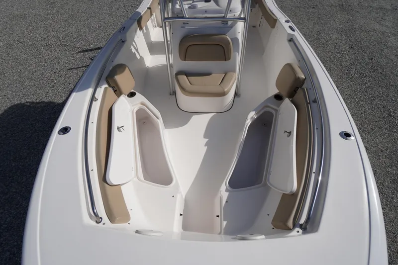 Slide: The Image of 2019 Tidewater 220 LXF boat interior with seating and storage compartments. - 8