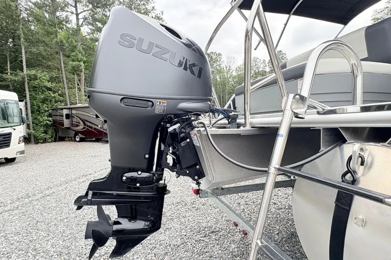 Slide: The Image of 2024 Starcraft 20 EX QDH boat interior with gray seating and flooring. - 7