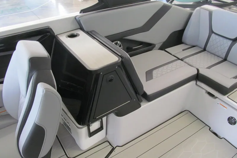 Slide: The Image of 2025 Yamaha Boats 255XD interior with modern seating and sleek design. - 11