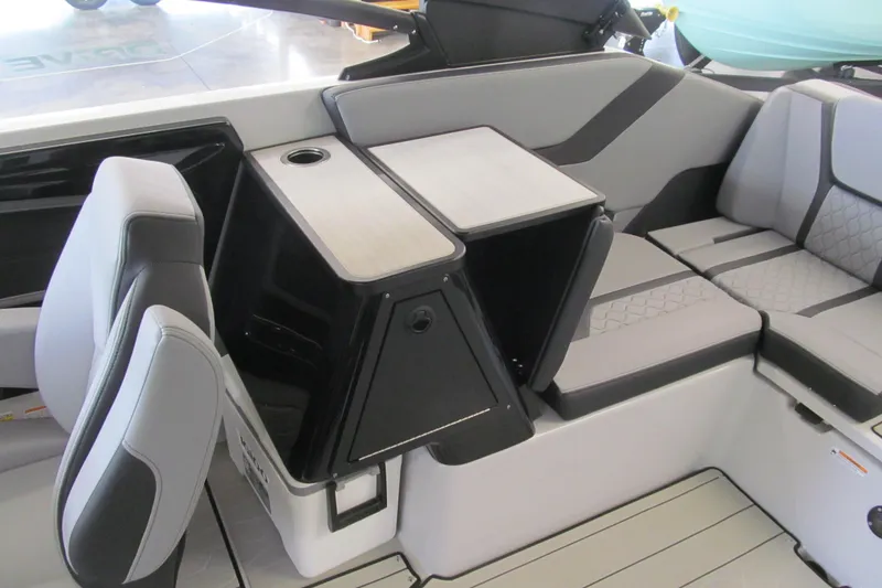 Slide: The Image of 2025 Yamaha Boats 255XD interior with sleek seating and modern design. - 12