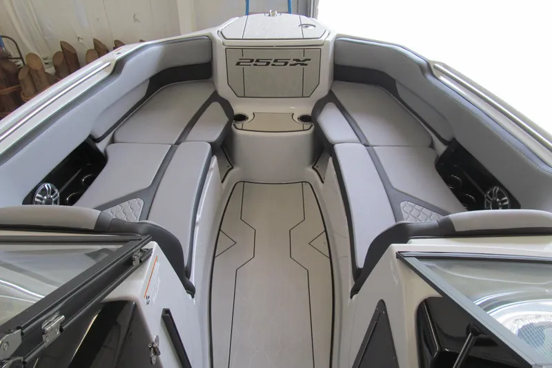 Slide: The Image of 2025 Yamaha Boats 255XD interior with sleek seating and modern design. - 5