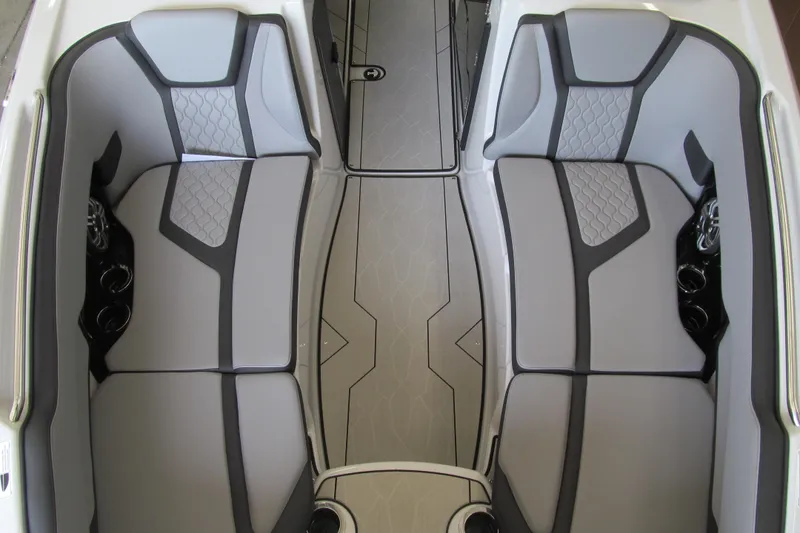 Slide: The Image of 2025 Yamaha Boats 255XD interior with sleek gray seating and modern design. - 8