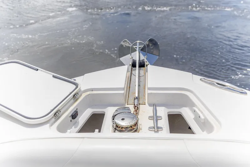 Slide: The Image of Bow of 2023 Edgewater 262CC boat with anchor and storage compartments. - 4