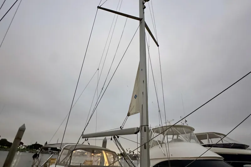 Slide: The Image of Sailboat mast of 2021 Beneteau Oceanis 55.1 docked at marina. - 24