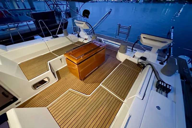 Slide: The Image of Luxurious Beneteau Oceanis 55.1 yacht deck, 2021 model, with elegant wooden flooring. - 27