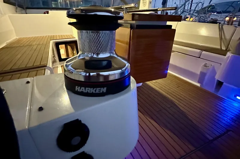 Slide: The Image of Deck of 2021 Beneteau Oceanis 55.1 yacht with Harken winch and wooden flooring. - 33