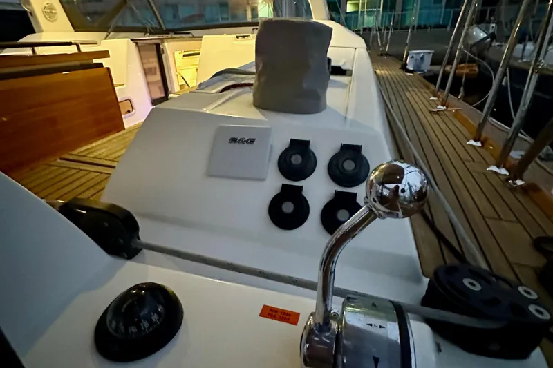 Slide: The Image of Beneteau Oceanis 55.1 yacht deck, 2021 model, featuring modern navigation equipment. - 36