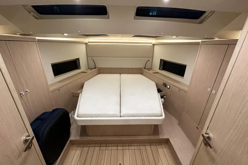Slide: The Image of Luxurious interior cabin of 2021 Beneteau Oceanis 55.1 yacht with modern design. - 77