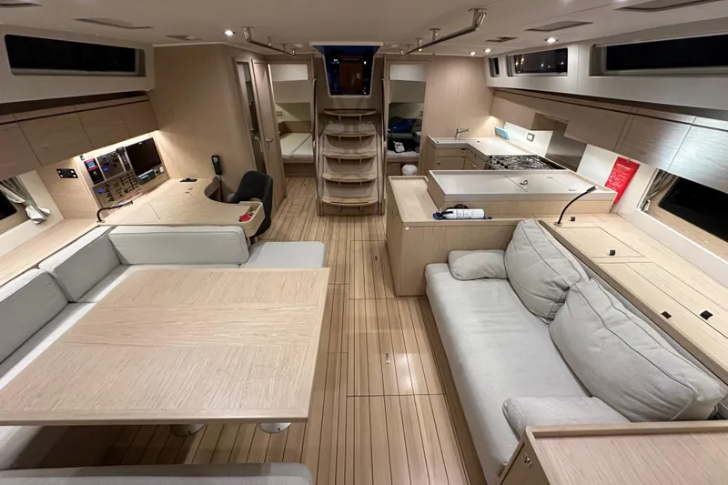 Slide: The Image of Luxurious interior of a 2021 Beneteau Oceanis 55.1 yacht with modern furnishings and spacious layout. - 87