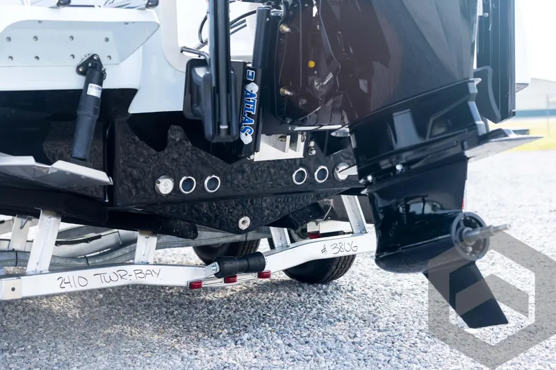 Slide: The Image of Tidewater 2410 Bay Max 2026 boat on trailer, rear view with motor and propeller. - 19