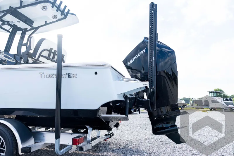 Slide: The Image of 2026 Tidewater 2410 Bay Max boat with Mercury engine on trailer. - 22