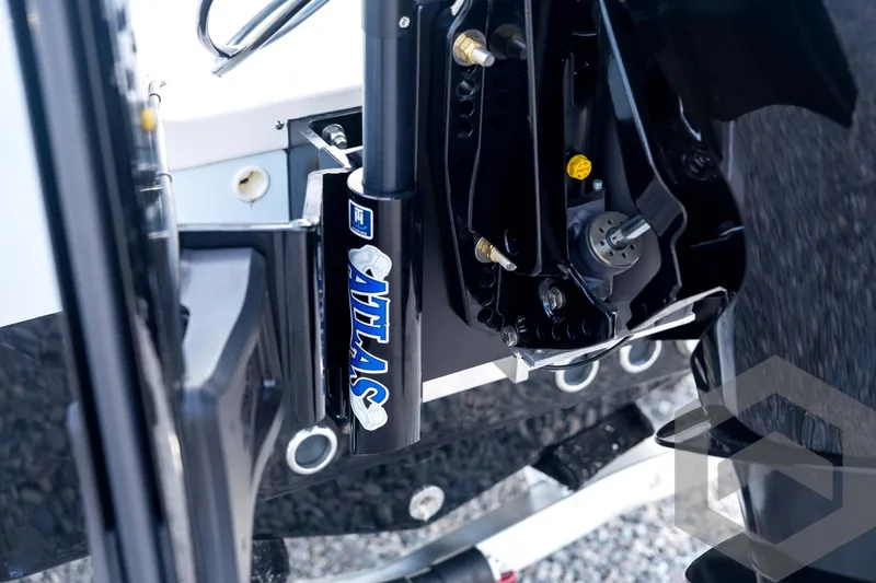 Slide: The Image of Close-up of 2026 Tidewater 2410 Bay Max boat's Atlas hydraulic jack plate. - 25