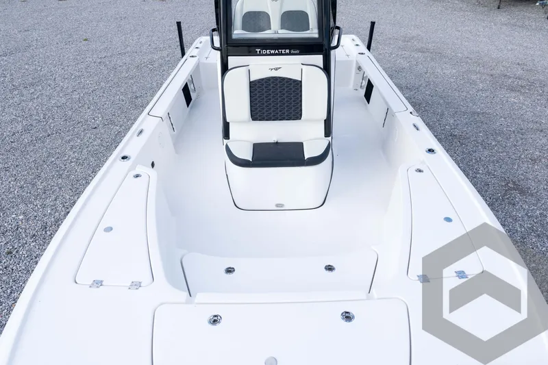Slide: The Image of 2026 Tidewater 2410 Bay Max boat interior with seating and storage compartments. - 32