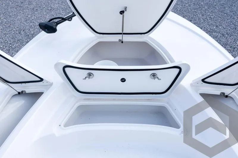 Slide: The Image of 2026 Tidewater 2410 Bay Max boat storage compartments open on deck. - 37