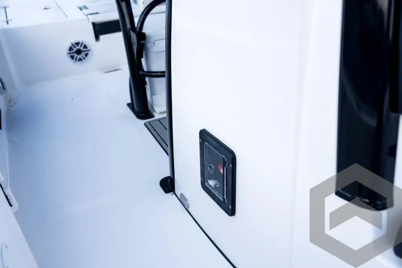 Slide: The Image of 2026 Tidewater 2410 Bay Max boat interior, featuring sleek white design and modern controls. - 51