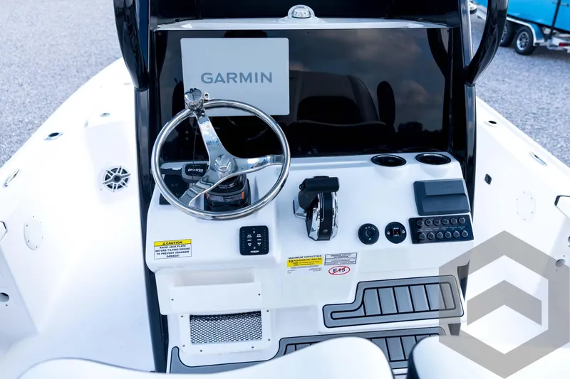 Slide: The Image of 2026 Tidewater 2410 Bay Max boat dashboard with Garmin navigation system. - 53
