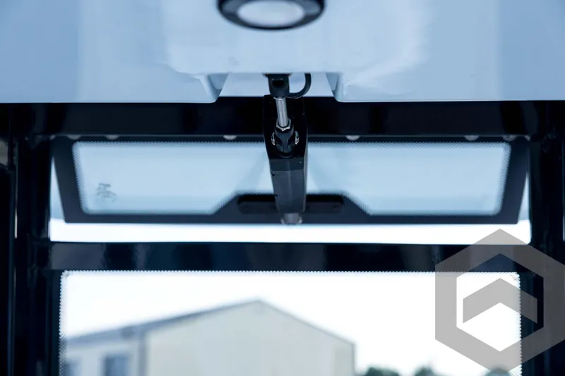 Slide: The Image of Close-up of 2026 Tidewater 2410 Bay Max boat windshield and wiper mechanism. - 56