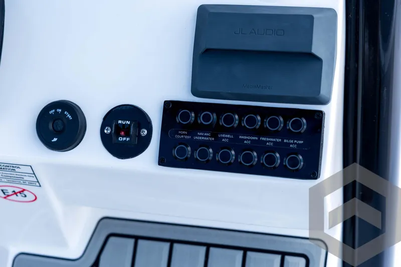Slide: The Image of Control panel of 2026 Tidewater 2410 Bay Max boat with JL Audio system. - 63