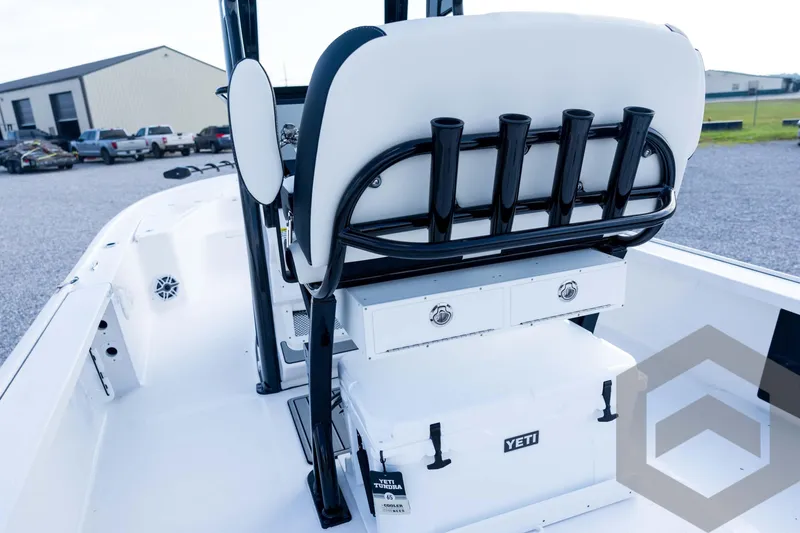 Slide: The Image of 2026 Tidewater 2410 Bay Max boat interior with rod holders and Yeti cooler. - 73