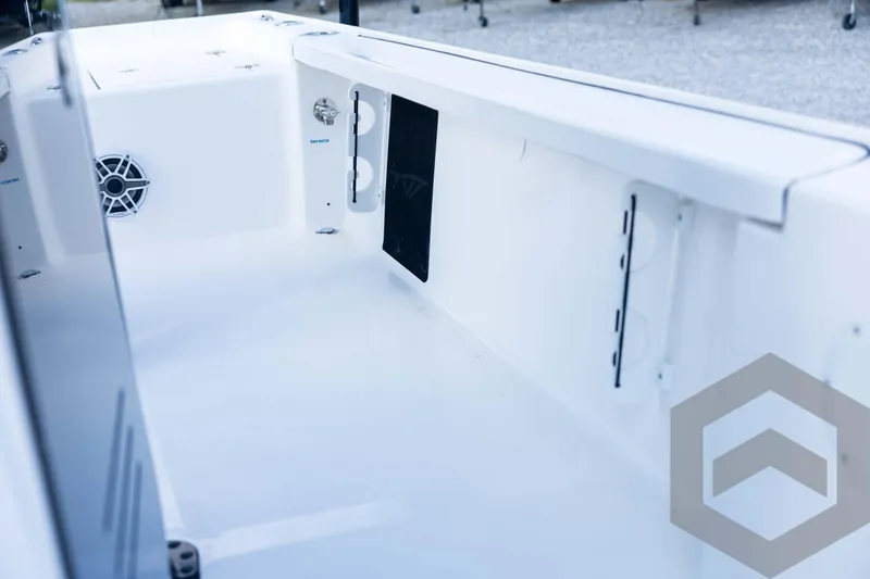 Slide: The Image of 2026 Tidewater 2410 Bay Max boat interior, featuring sleek white design and modern fixtures. - 81