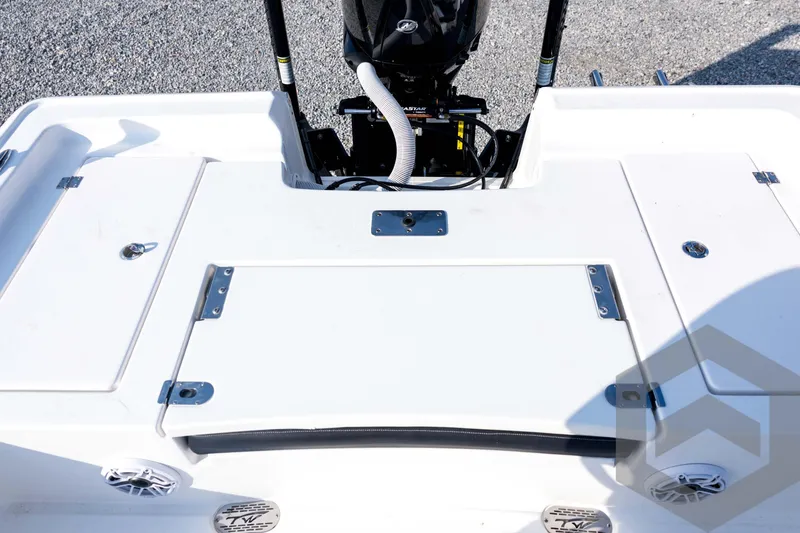 Slide: The Image of 2026 Tidewater 2410 Bay Max boat deck with motor and storage compartments. - 82