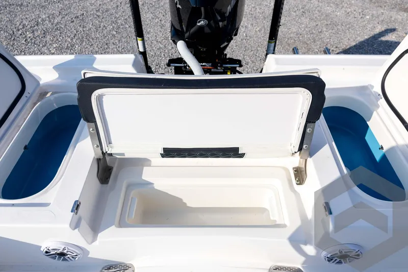 Slide: The Image of 2026 Tidewater 2410 Bay Max boat interior with storage compartments and seating. - 83