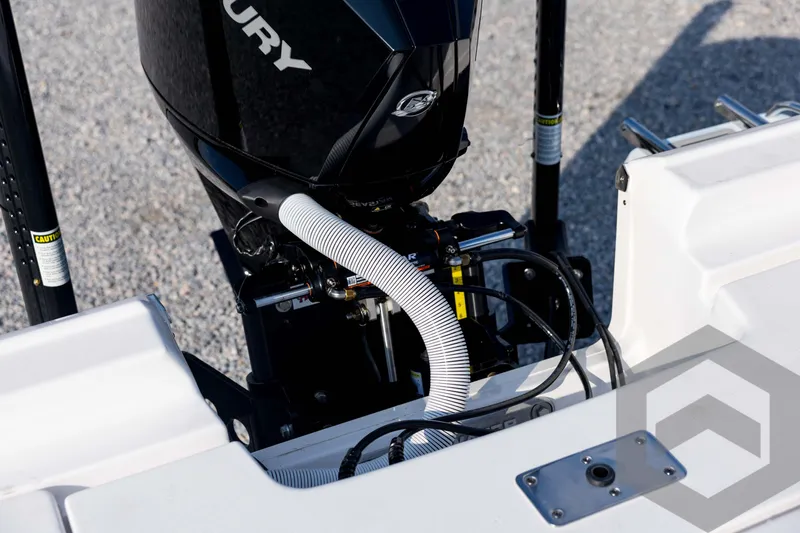 Slide: The Image of 2026 Tidewater 2410 Bay Max boat engine detail with Mercury motor and cables. - 89