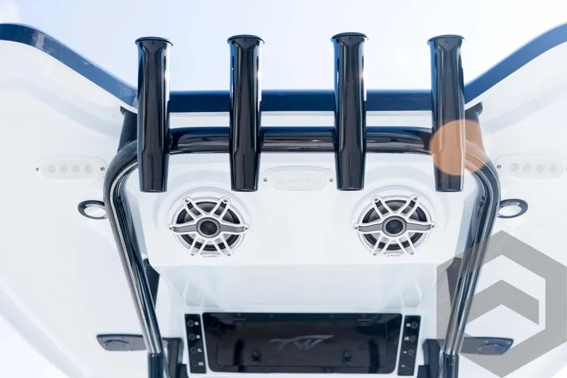 Slide: The Image of Tidewater 2410 Bay Max 2026 boat speakers and rod holders on T-top, viewed from below. - 91